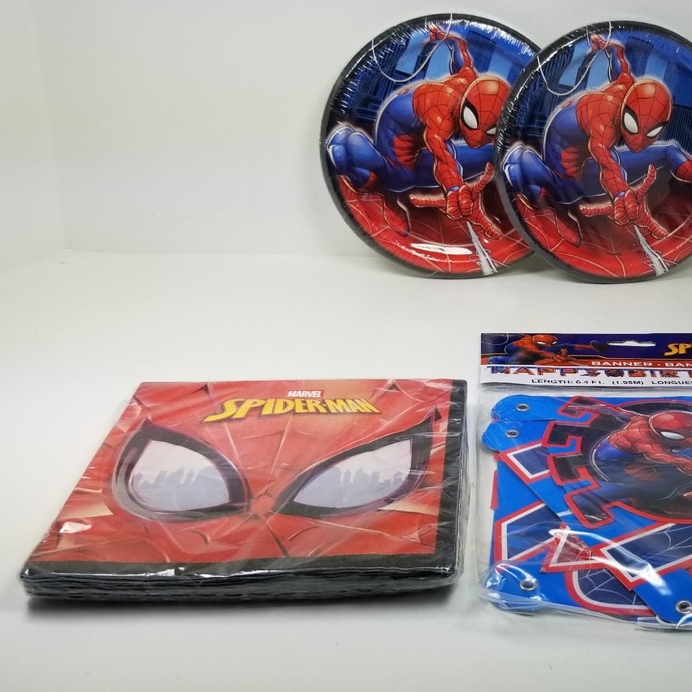 Spiderman party set includes napkins, cake plates and banner